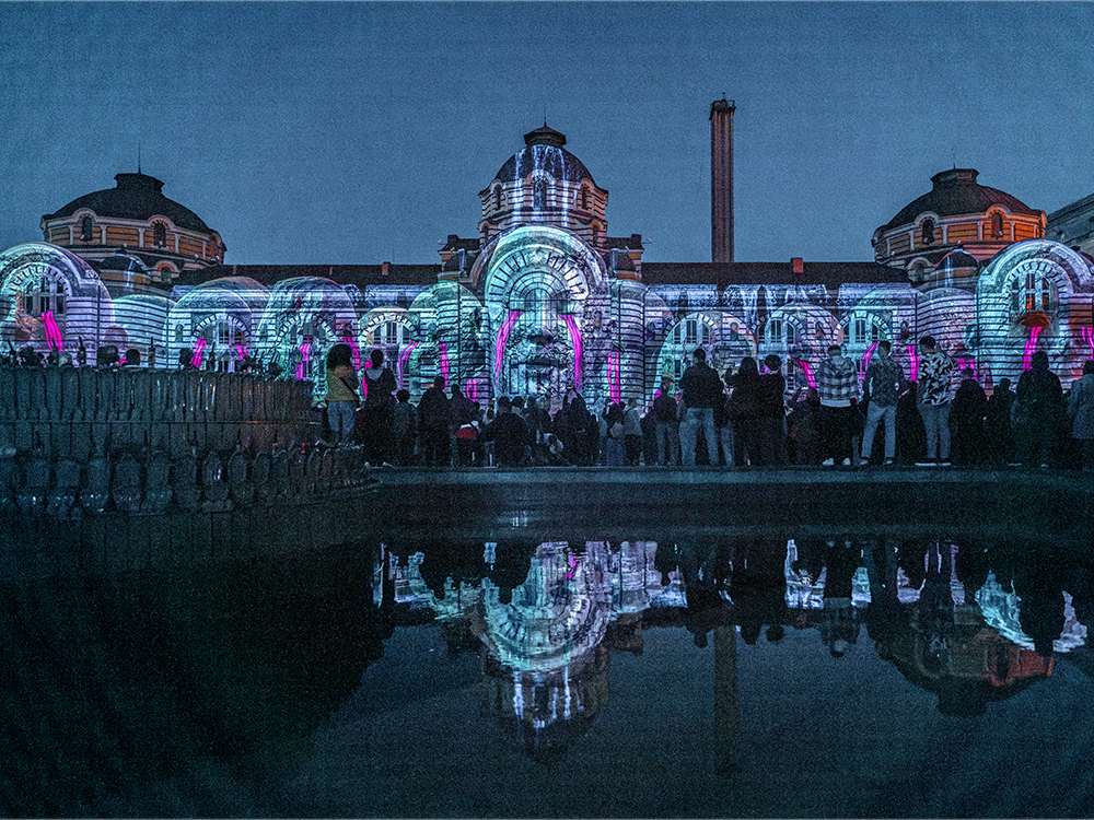 Visitors enjoying the immersive video mapping show in Sofia